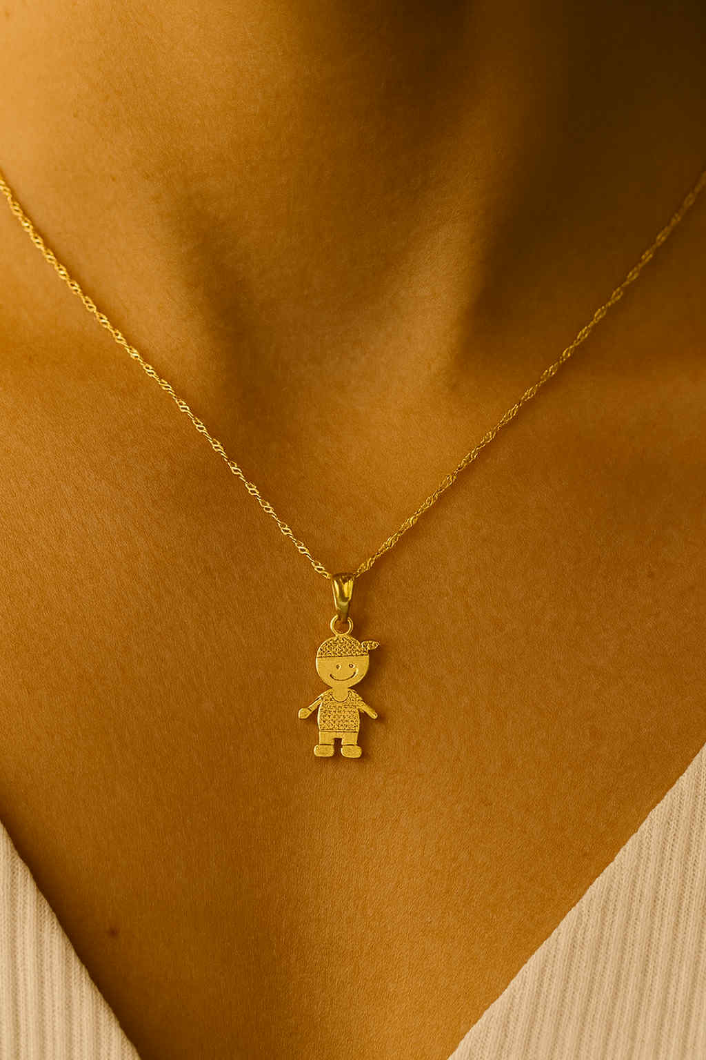 18K gold-plated  necklace set features a symbolic boy Pendant design.
